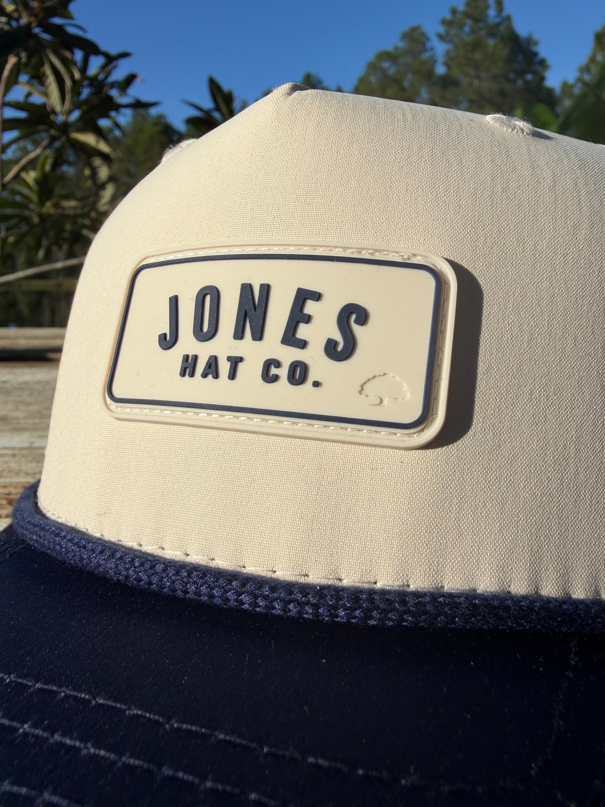 Close-up of debossed oak tree detail on Jones Hat Co. patch